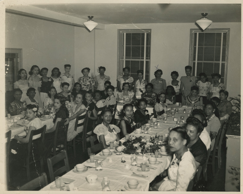 Black and white photograph of AKA banquet. SPC marked with an 'x'. 1945. 