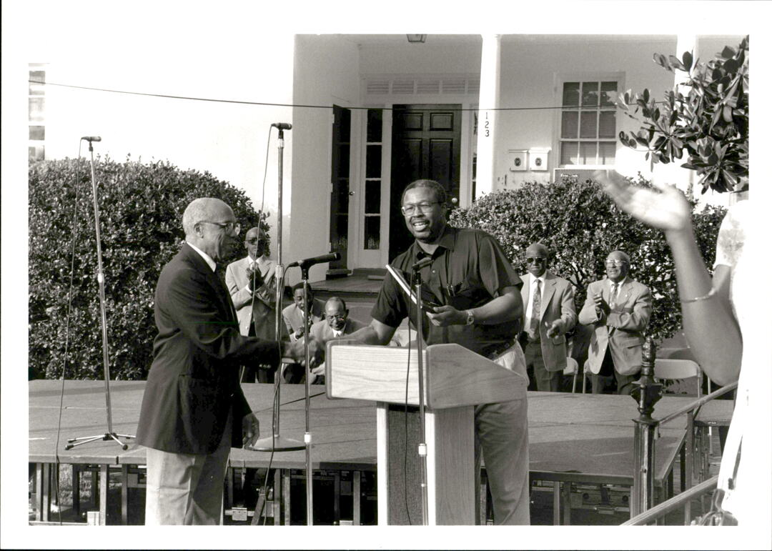 Avery ED Marvin Dulaney presenting an award to Elmore Browne